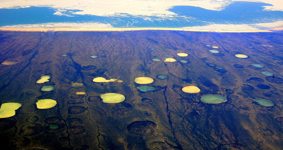 Fig. 8: Methane-eruption craters are now appearing across wide stretches of Siberia (Image: Encyclopedia Environment)